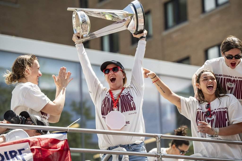 Montreal Victoire goaltender Ann-Renee Desbiens hoists the Walter Cup while surrounded by teammates, during Montreal Victoire’s victory celebration in Montreal, on Saturday, May 30, 2026.