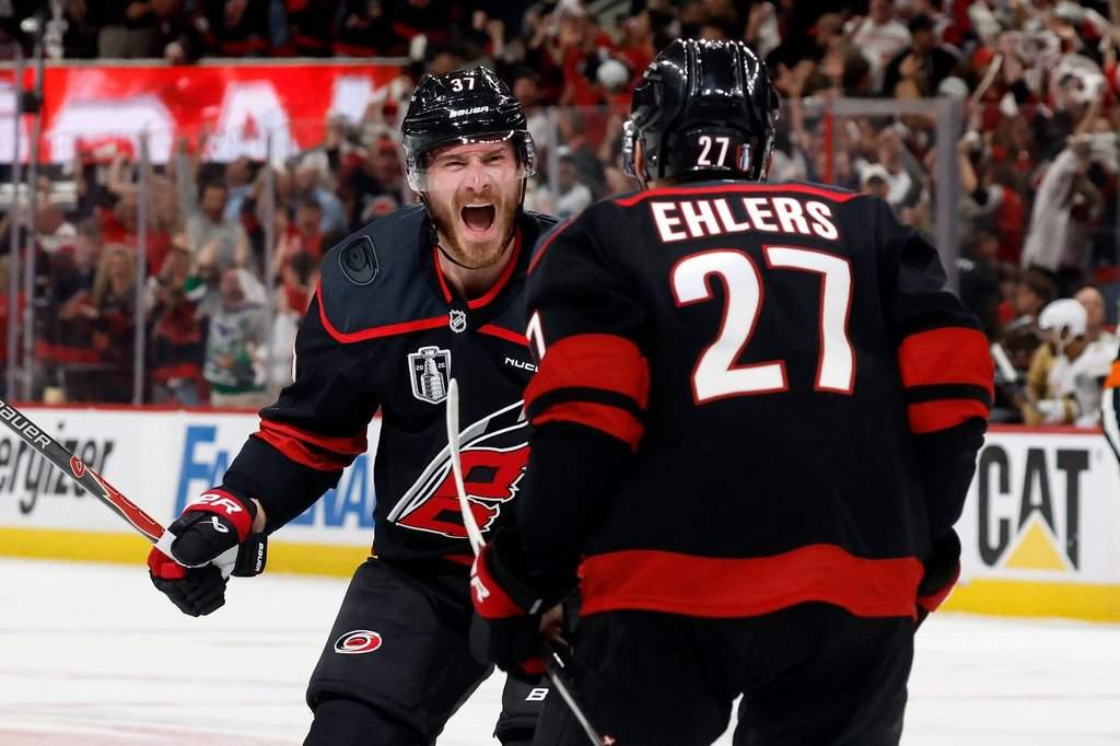 The Carolina Hurricanes' Andrei Svechnikov (37) celebrates after his goal with Nikolaj Ehlers (27) during the second period in Game 5 of the NHL hockey Stanley Cup final series against the Vegas Golden Knights in Raleigh, N.C., Thursday, June 11, 2026.