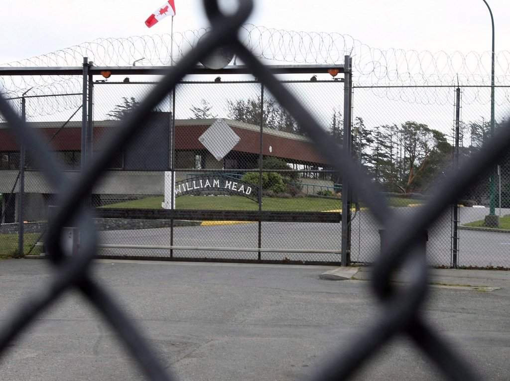 William Head Institution is shown through a security fence in Victoria, B.C., on Wednesday, Feb. 27, 2008. Inmate Ernest Jensen escaped the prison on June 28, 2026 and his body was found on June 29, 2026 in the ocean off the prison's shoreline.