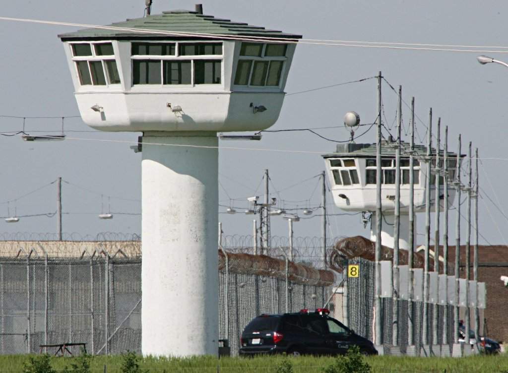A prison van drives around the Sainte-Anne-des-Plaines correctional facility in Sainte-Anne-des-Plaines, Quebec, on July 3, 2005. 