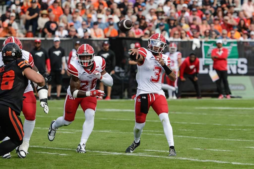 Calgary Stampeders quarterback Vernon Adams Jr. (3) drops back and passes against the B.C. Lions during first half CFL football action in Kelowna, B.C., on Saturday, June 27, 2026. THE CANADIAN PRESS/Steve Dunsmoor.