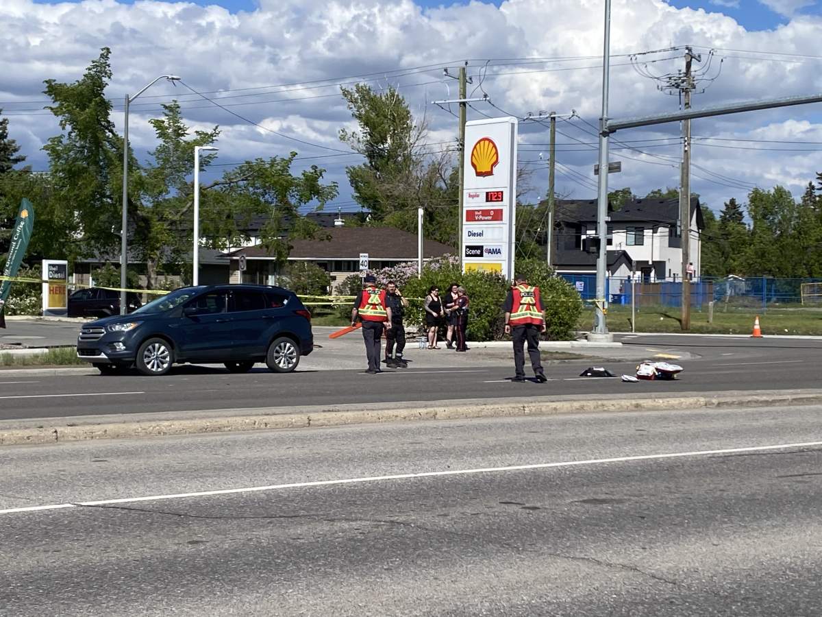 Calgary police investigate the scene of a serious crash involving a pedestrian at the corner of 37 St and Bow Tr. SW on June 5, 2026.