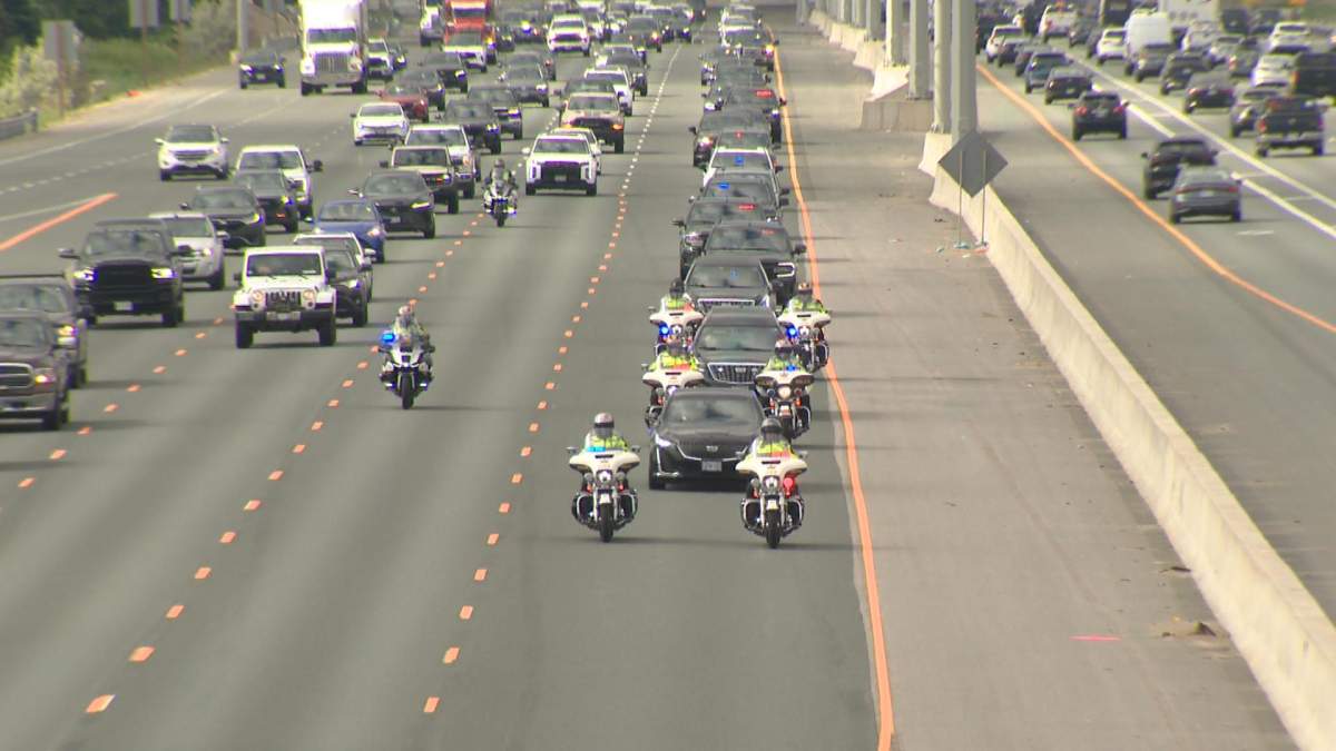 A police procession escorts the repatriated body of OPP Const. Tarun Bali on Wednesday, June 10, 2026.