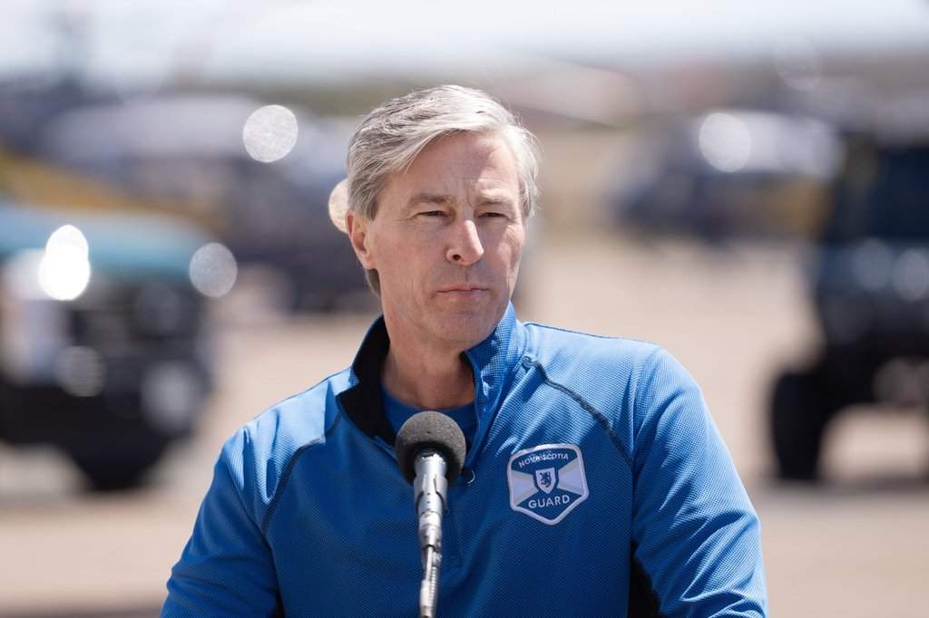 Nova Scotia Premier Tim Houston speaks during an announcement of four new contracted fixed-wing water bombers and a co-ordination plane for wildfire response in Debert, N.S. on Wednesday, May 13, 2026. THE CANADIAN PRESS/Darren Calabrese.