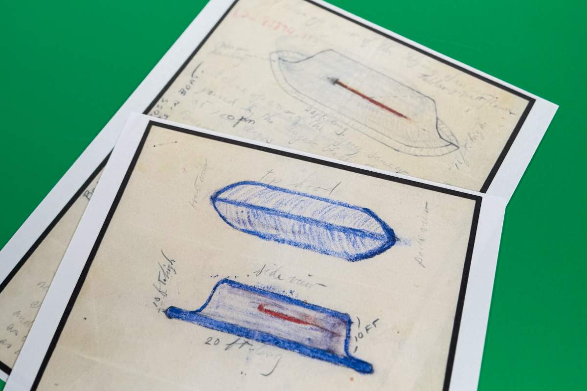 Files on UFOs, released May 8, 2026, by the Pentagon, are photographed in Washington. (AP Photo/Jon Elswick)