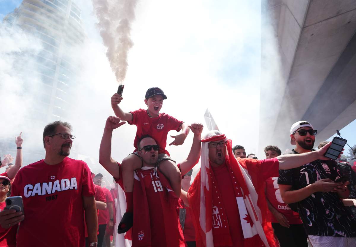 Canada soccer fans march prior to a World Cup Group B soccer match, against Qatar in Vancouver, on Thursday, June 18, 2026. THE CANADIAN PRESS/Ethan Cairns