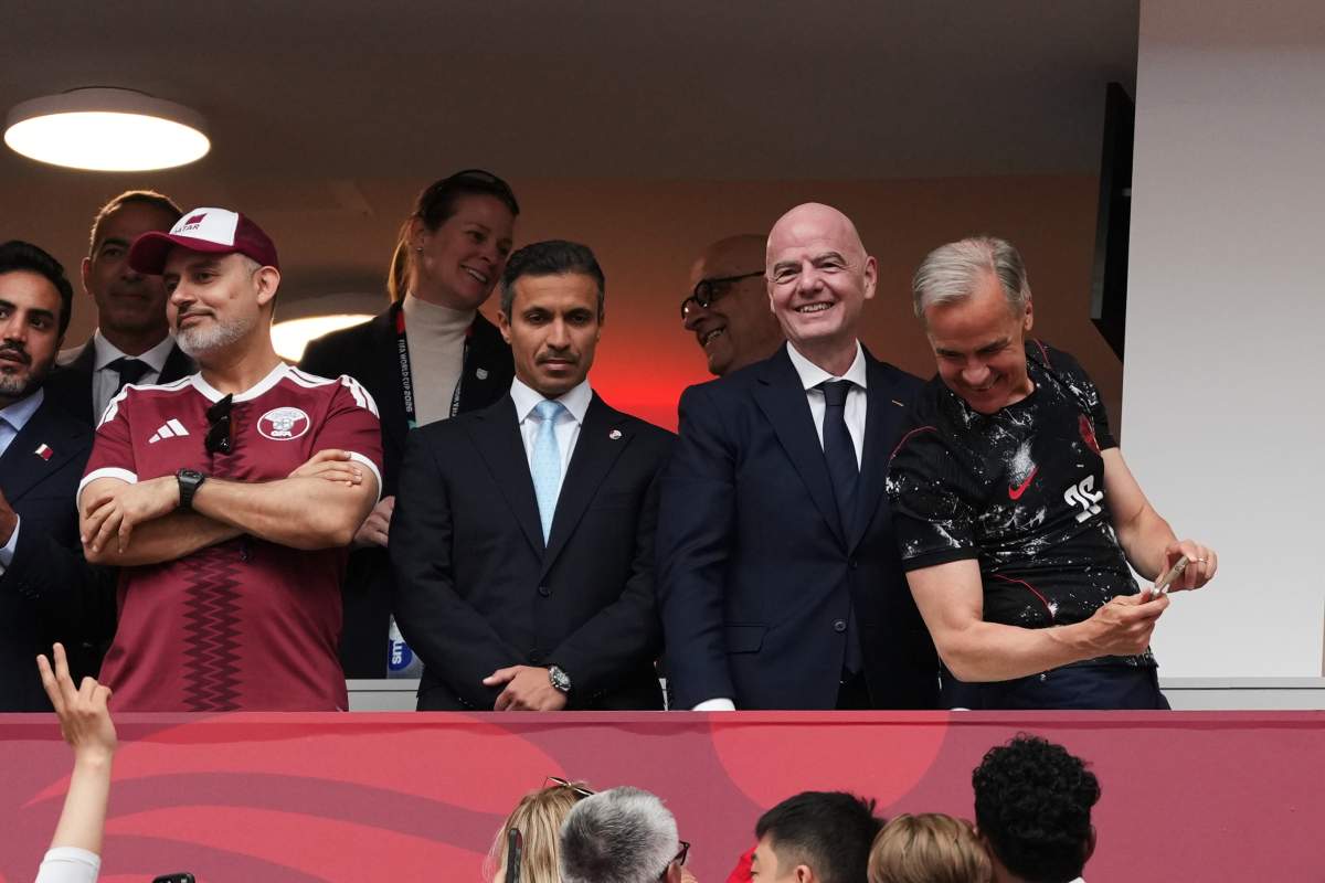 FIFA President Gianni Infantino, second from right, and Canada Prime Minister Mark Carney, right, attend the World Cup Group B soccer match between Canada and Qatar in Vancouver, British Columbia, Thursday, June 18, 2026.