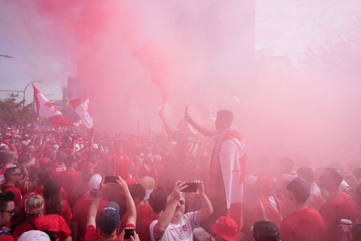 Canada fans march to B.C. Place stadium before Canada and Switzerland play a World Cup Group B soccer match, in Vancouver, on Wednesday, June 24, 2026. THE CANADIAN PRESS/Darryl Dyck