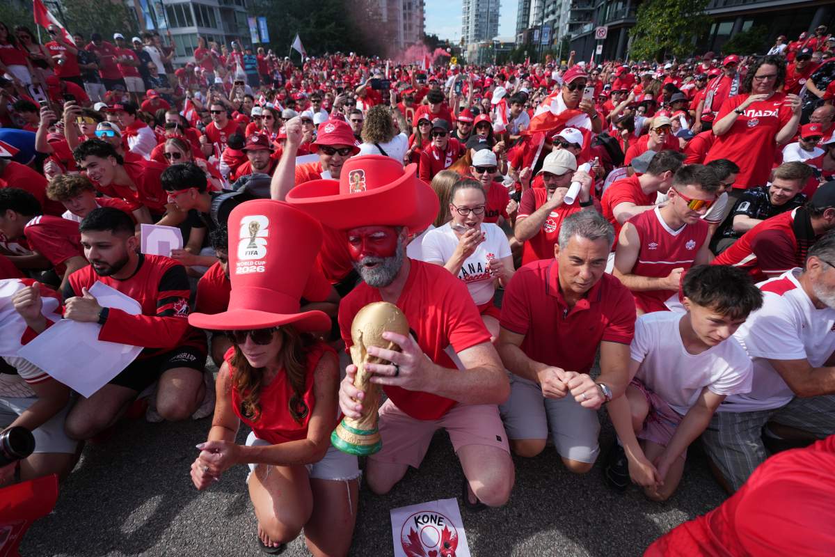Canada fans march to B.C. Place stadium before Canada and Switzerland play a World Cup Group B soccer match, in Vancouver, on Wednesday, June 24, 2026. THE CANADIAN PRESS/Darryl Dyck