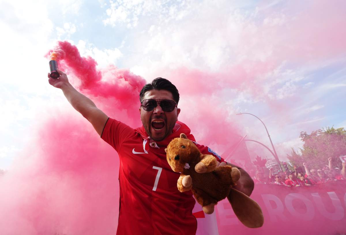 Canada fans march to B.C. Place stadium before Canada and Switzerland play a World Cup Group B soccer match, in Vancouver, on Wednesday, June 24, 2026. THE CANADIAN PRESS/Ethan Cairns