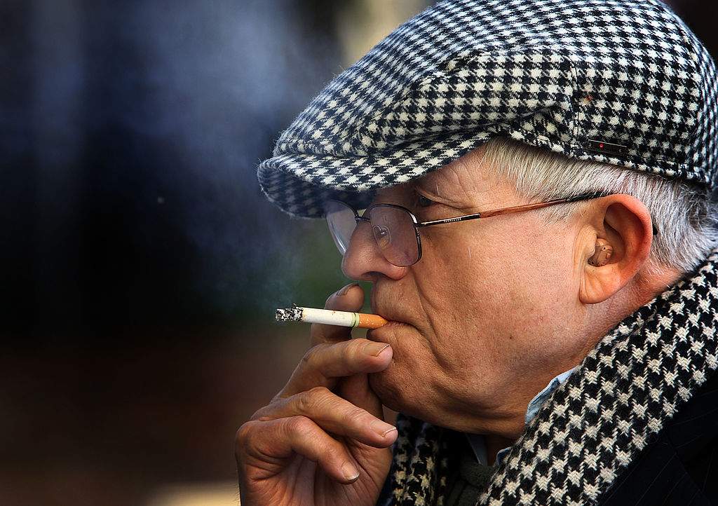 FILE: Artist David Hockney smokes a cigarette during a break from a tour of the new Nottingham Contemporary art space which is holding a major retrospective of his work on November 30, 2009 in Nottingham, England.