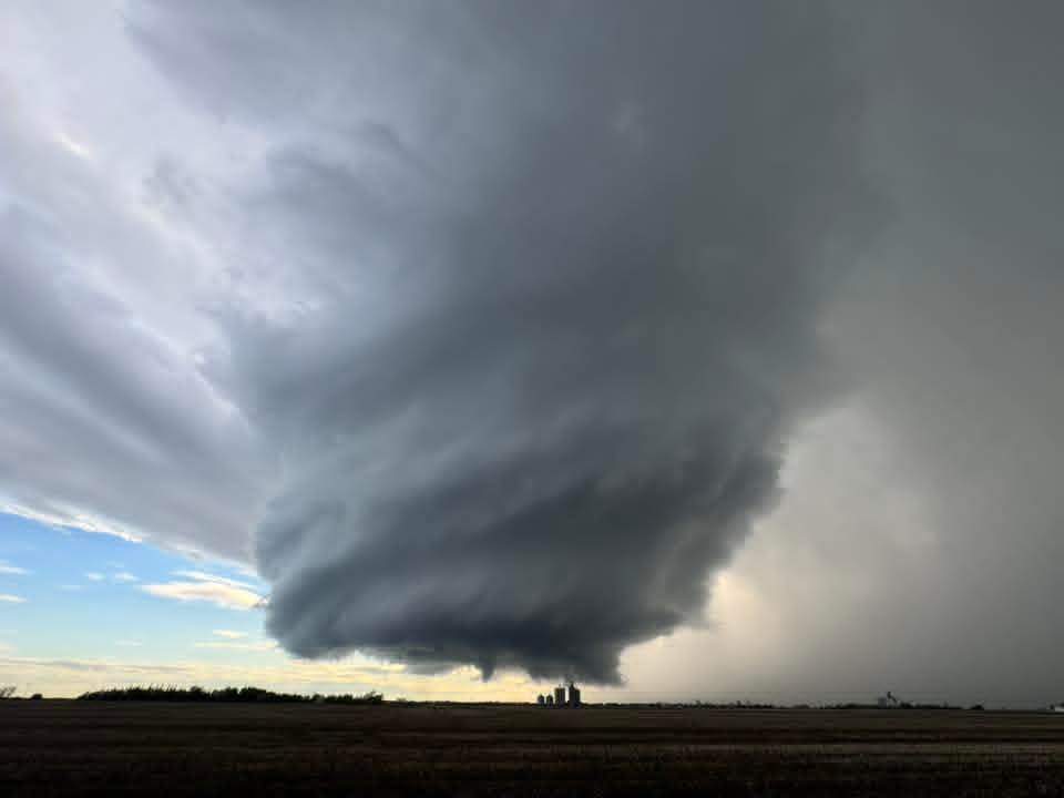 A funnel cloud forming near Girouxville, Alta. on Monday, June 15, 2026. 