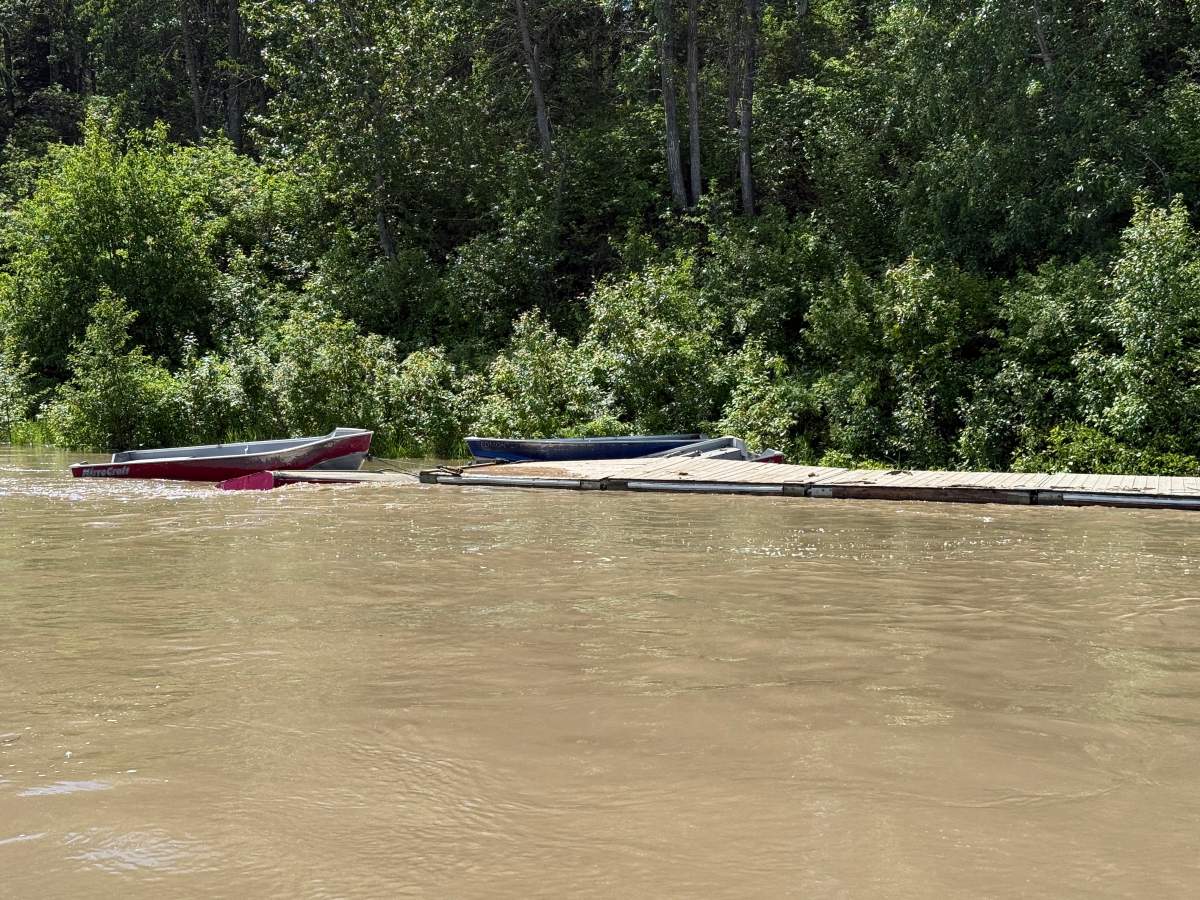 A dock and boats owned by the Edmonton Rowing Club were found several hundred kilometres downstream on the North Saskatchewan River, near the town of Two Hills, Alta., on June 23, 2026.