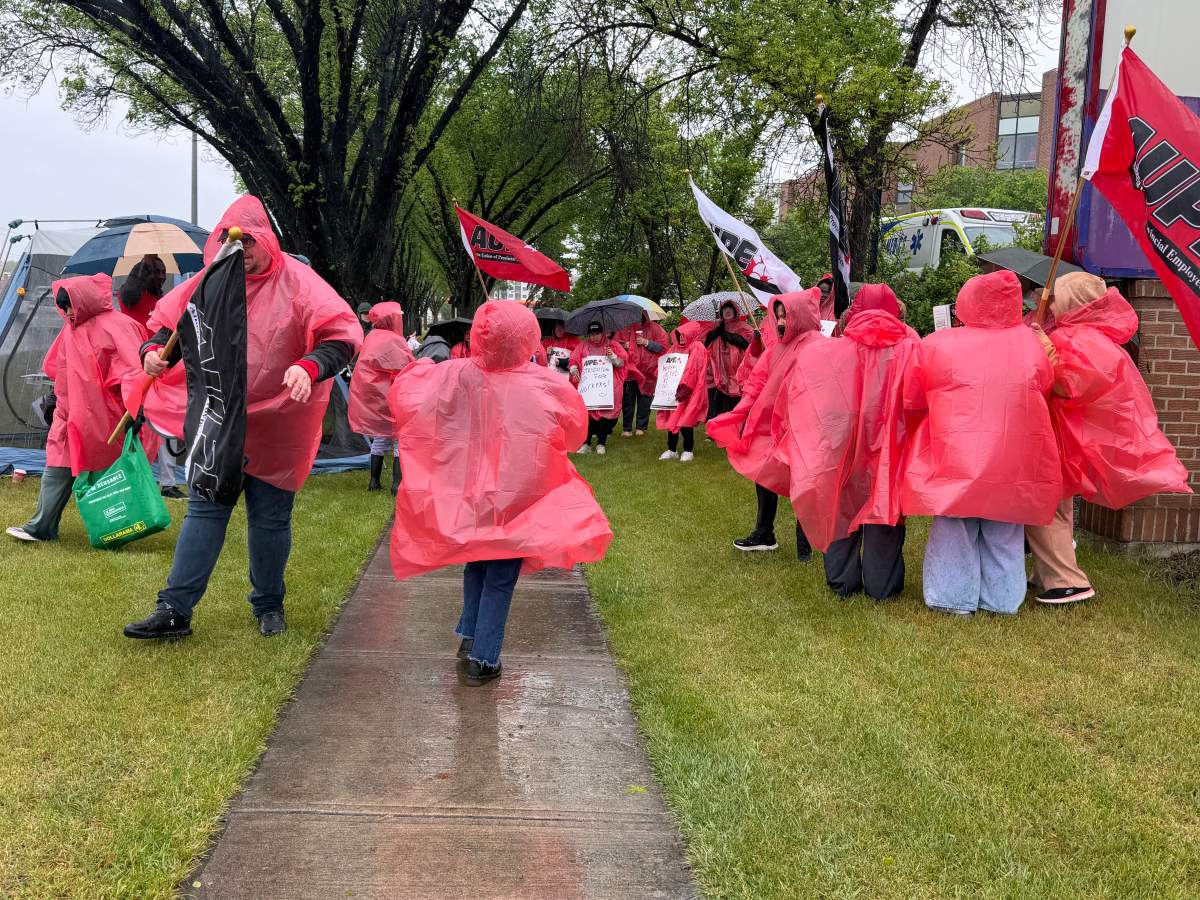 AUPE members in Calgary rally for better working conditions.