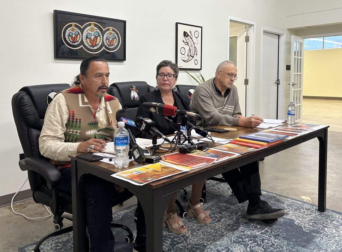 Councillor Karl Stone, left to right, Dakota Tipi First Nation Manitoba and Cree advocate Coleen Rajotte and community advocate Gerald Neufeld take part in a news conference in Winnipeg on June 23, 2026.