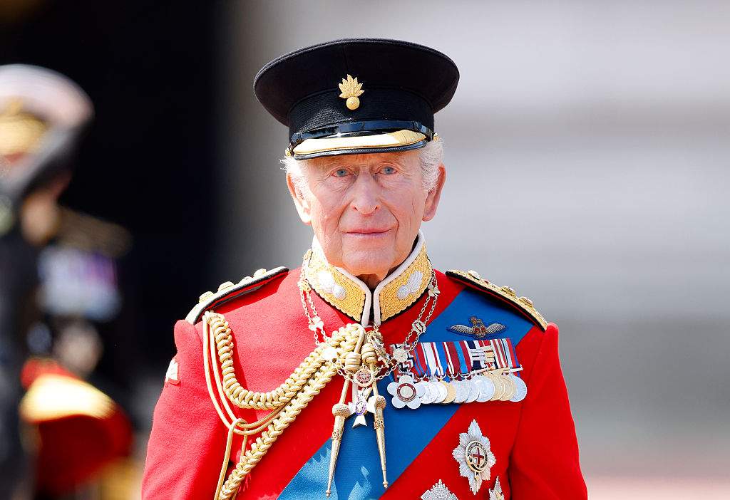 King Charles III (Colonel-in-Chief of the Grenadier Guards) takes the salute from a dais outside Buckingham Palace during Trooping the Colour 2026 on June 13, 2026 in London, England.