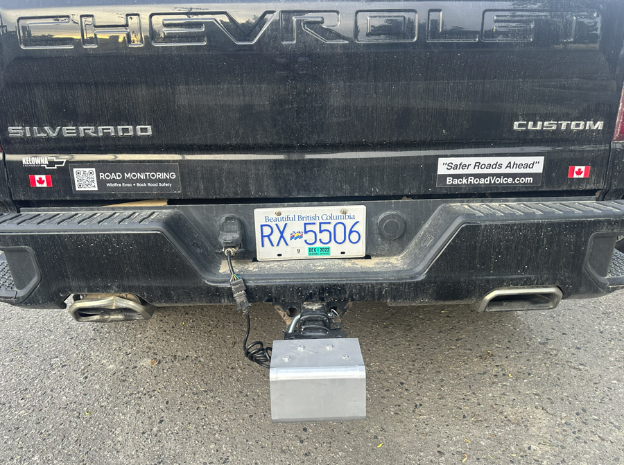 The survey tool attached to a truck hitch and wirelessly connects to a smart phone.