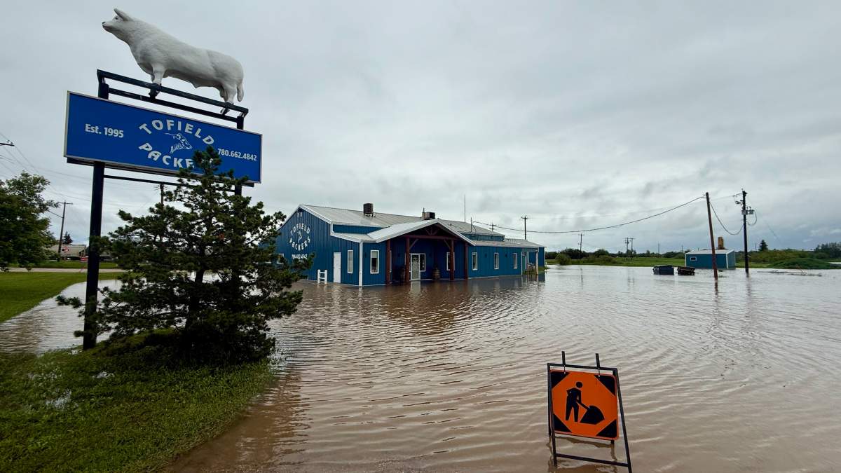 The flooded parking lot of Tofield Packers in Tofield, Alta. on Monday, June 22, 2026.