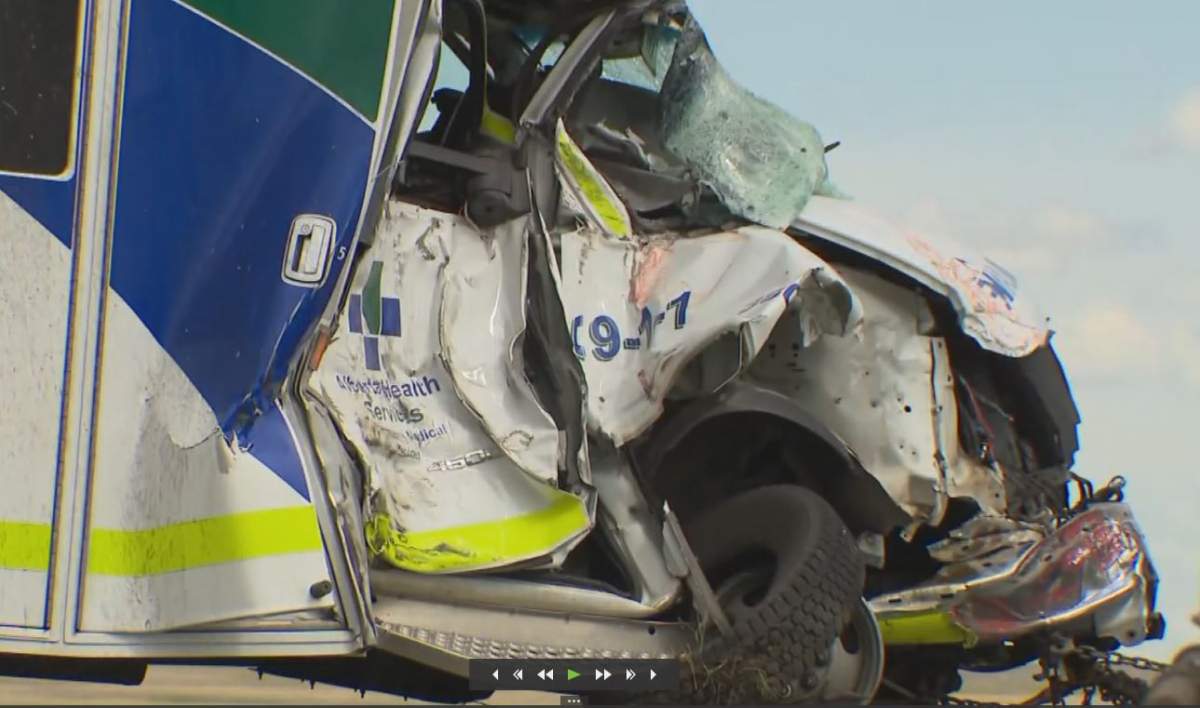 RCMP say both the ambulance, with its emergency equipment activated, and the tractor, were travelling west on Highway 9 just east of Beiseker, when the crash occured.