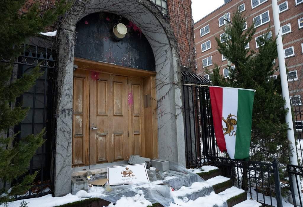 The shuttered Iranian embassy in Ottawa is seen after protesters hit it with anti-regime icons and red paint on Tuesday, Jan. 13, 2026. THE CANADIAN PRESS/Adrian Wyld.
