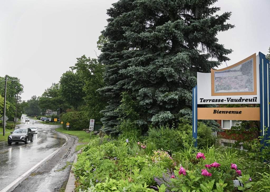A sign for the municipality of Terrasse-Vaudreuil is shown west of Montreal, on Sunday, June 14, 2026. The municipality of Terrasse-Vaudreuil, Que., has taken a historic step by adopting a resolution that makes it the first municipality in Quebec and Canada to sign the petition in support of the Universal Declaration of the Rights of the Tree. THE CANADIAN PRESS/Graham Hughes.