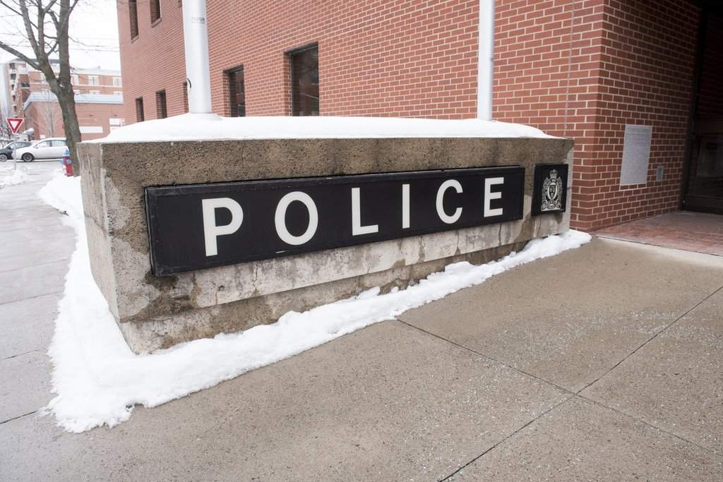 The Fredericton Police Force building is seen in downtown Fredericton, on Friday, Feb. 5, 2021. THE CANADIAN PRESS/Stephen MacGillivray.