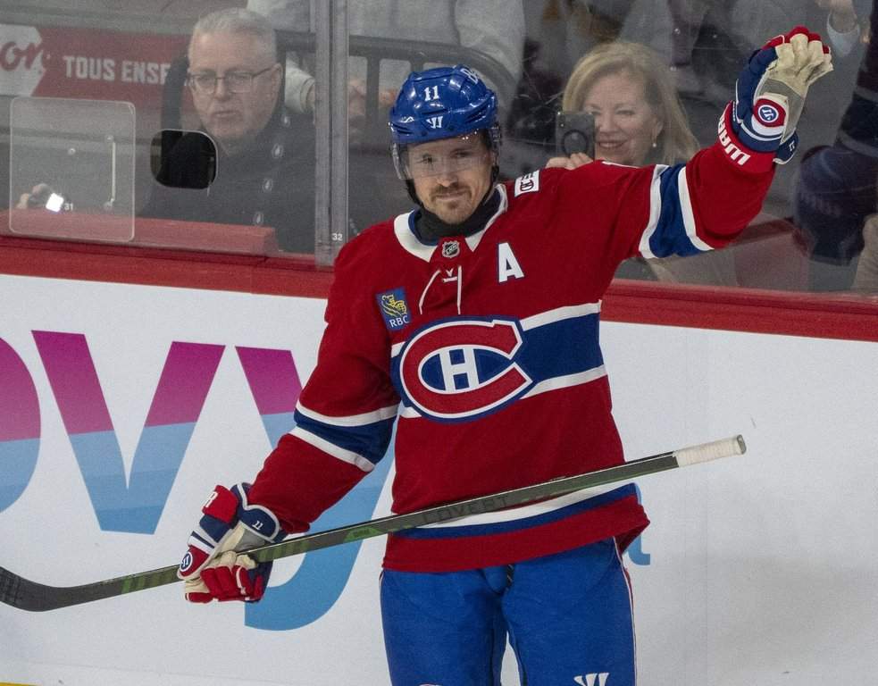Montreal Canadiens’ Brendan Gallagher (11) reacts as he is acknowledged for his 900th NHL game during first period NHL hockey action against the Boston Bruins in Montreal on Tuesday, March 17, 2026.
