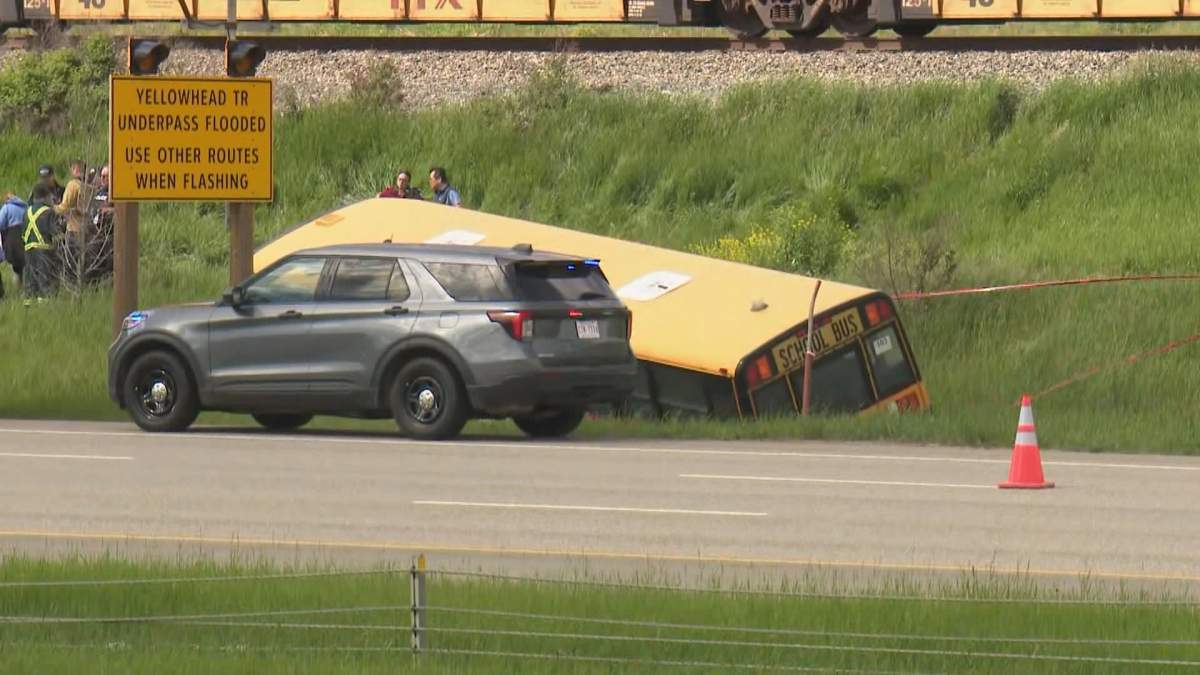 The Edmonton Catholic School District said there were 49 students and seven adults on board the bus when the crash happened.