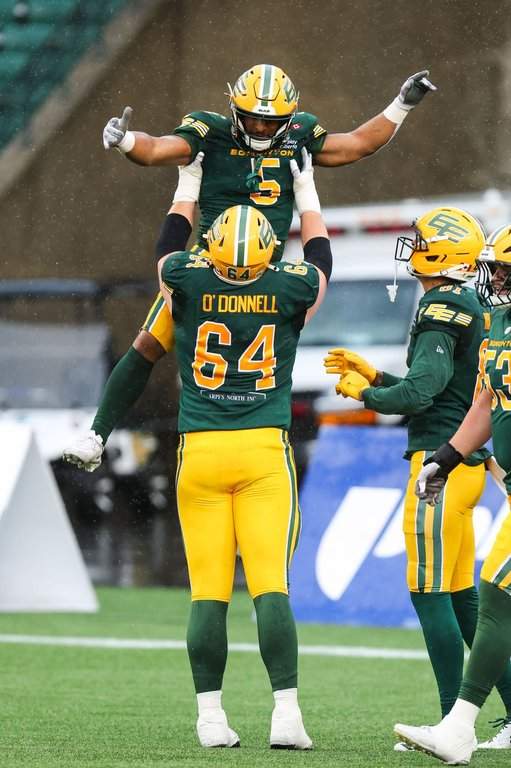 Edmonton Elks' Justin Rankin (5) celebrates a touchdown against the Montreal Alouettes during second half CFL football action in Edmonton on Saturday, June 20, 2026. THE CANADIAN PRESS/Codie McLachlan.