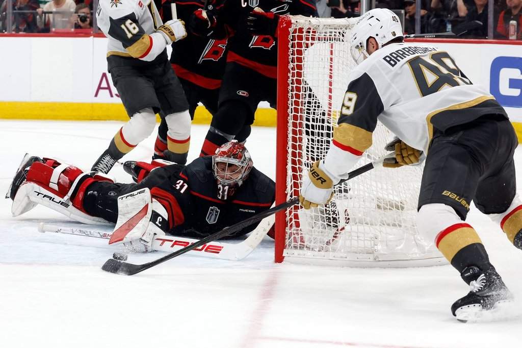 Carolina Hurricanes goaltender Frederik Andersen (31) stops a shot by the Vegas Golden Knights' Ivan Barbashev (49) during the third period in Game 2 of the NHL hockey Stanley Cup final series in Raleigh, N.C., Thursday, June 4, 2026.