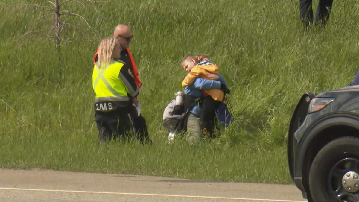 A number of what appeared to be parents or guardians could also be seen arriving at the crash scene to collect and console their children.