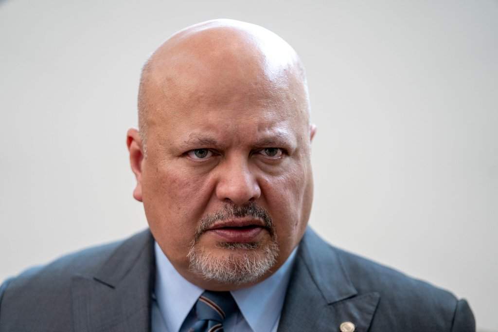 FILE - Karim Khan, Prosecutor of the International Criminal Court, looks up prior to a press conference in The Hague, Netherlands, July 3, 2023. (AP Photo/Peter Dejong, File).