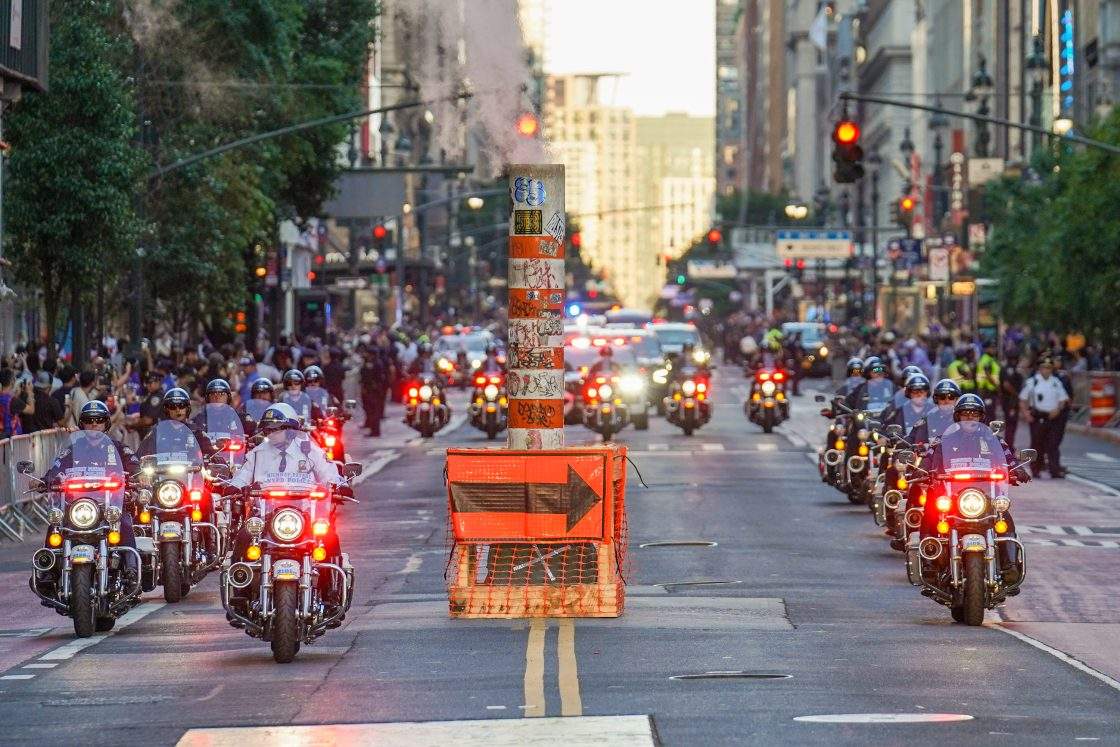 NYPD officers escort the motorcade of President Donald Trump outside of Madison Square Garden ahead of Game 3 of the NBA Finals basketball series, Monday, June 8, 2026, in New York.