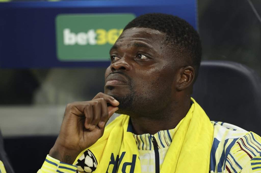 Villarreal's Thomas Partey sits on the bench during the Champions League soccer match between Tottenham and Villarreal in London, Tuesday, Sept. 16, 2025. 