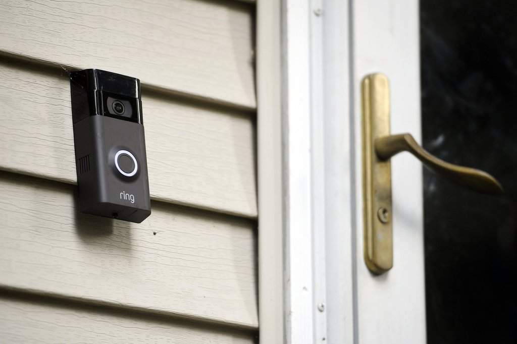 FILE — a Ring doorbell camera is seen installed outside a home in Wolcott, Conn., on July 16, 2019. (AP Photo/Jessica Hill, File).
