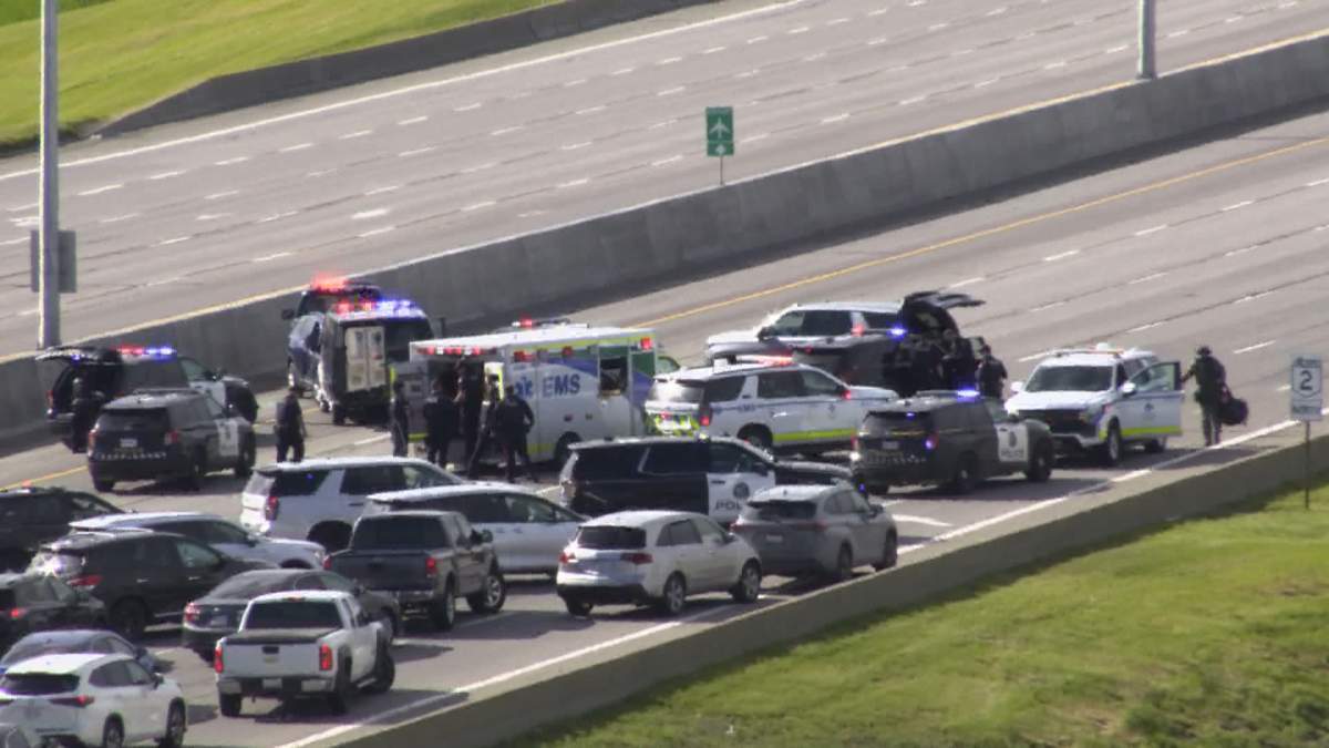 This image, taken from a traffic camera, shows a large number of emergency vehicles on scene along Deerfoot Trail Sunday after a woman was fatally shot by police who were responding to reports of an erratic driver.