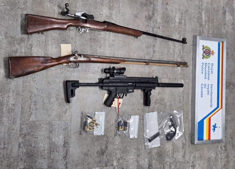 Four guns and ammunitions were seized from a home in a south Saskatchewan municipality. A 23-year-old man was arrested, police said.