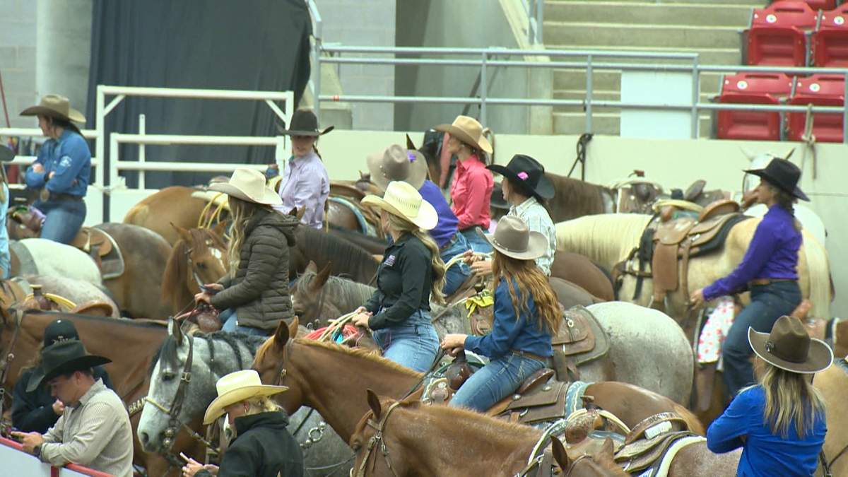 Breakaway ropers wait for their turn to compete.