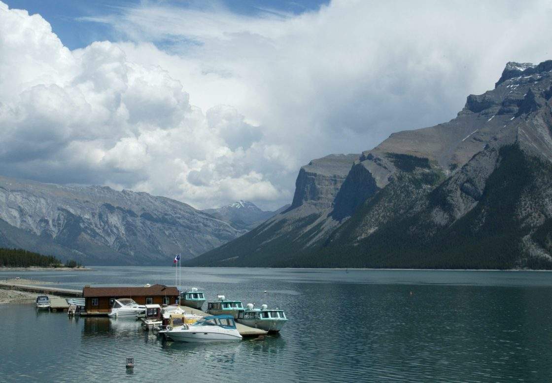 Boats sit anchored at the dock on Lake Minnewanka in Banff National Park near the town of Banff, Tuesday June 29, 2004.