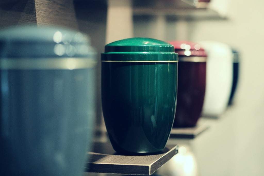 A file photo of funeral urns aligned.