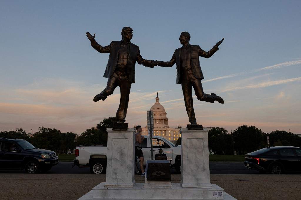 A statue depicting U.S. President Donald Trump and Jeffrey Epstein holding hands is seen near the U.S. Capitol in Washington, D.C., USA on October 2, 2025.