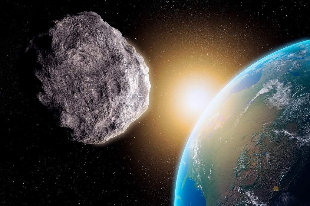 FILE - A large asteroid is seen passing by the Earth in this 2013 computer generated artwork. An asteroid nearly two kilometres across is about to pass the Earth this weekend.