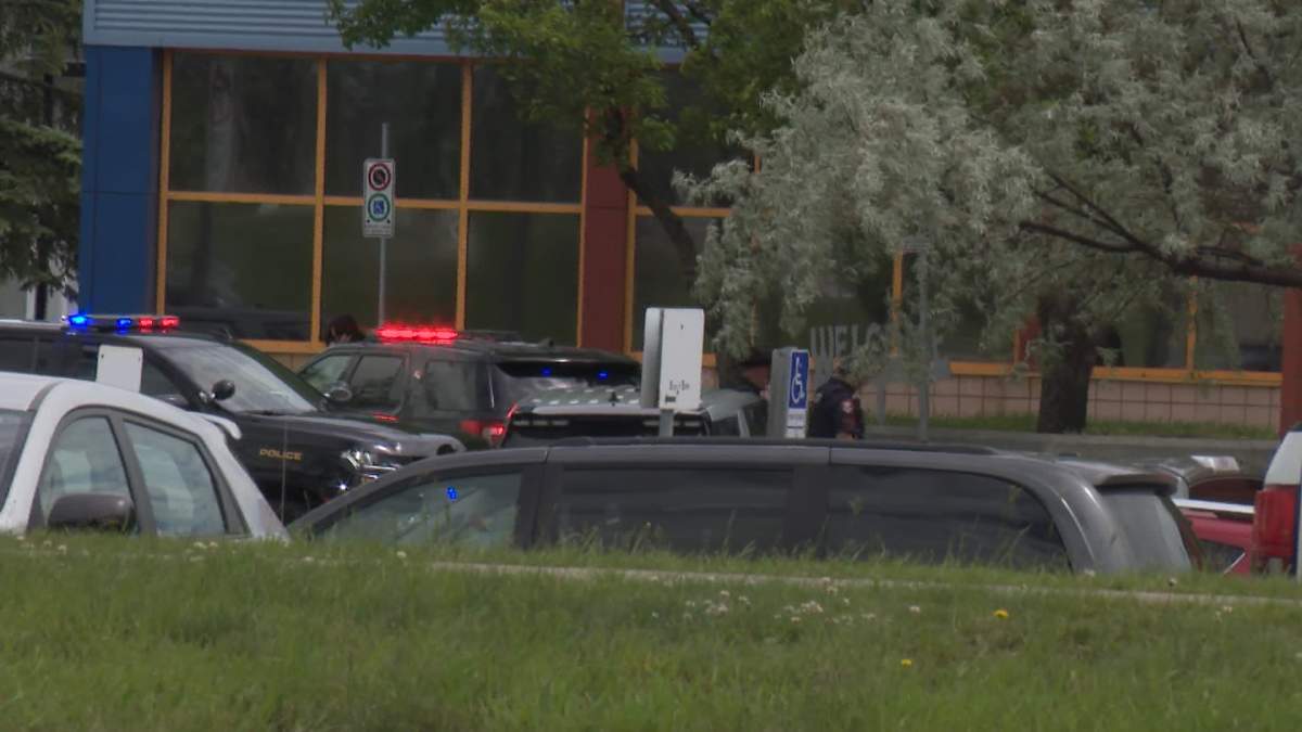 Calgary police, seen outside the school on Thursday, say the attack appears to have been premeditated.