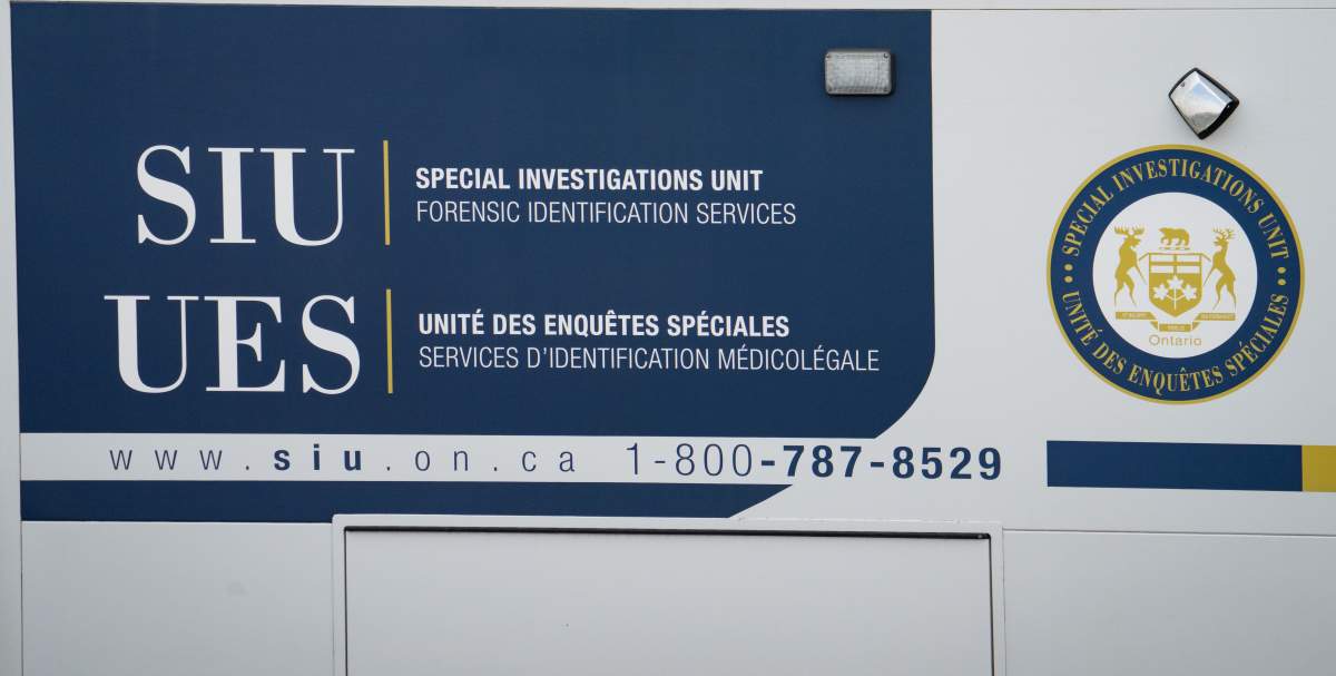 A Special Investigations Unit logo is seen on a truck near the scene of a police-involved shooting at the departures area of terminal 1 at Toronto Pearson International Airport, in Mississauga, Ont., on Thursday, April 24, 2025. 