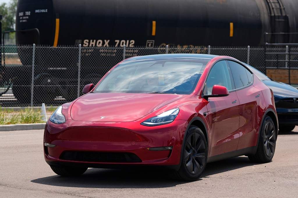 A file photo of a Tesla Model 3 sedan and Model X utility vehicle, rear, along a test track at the Electrify Expo in The Yards on July 14, 2024, in north Denver.