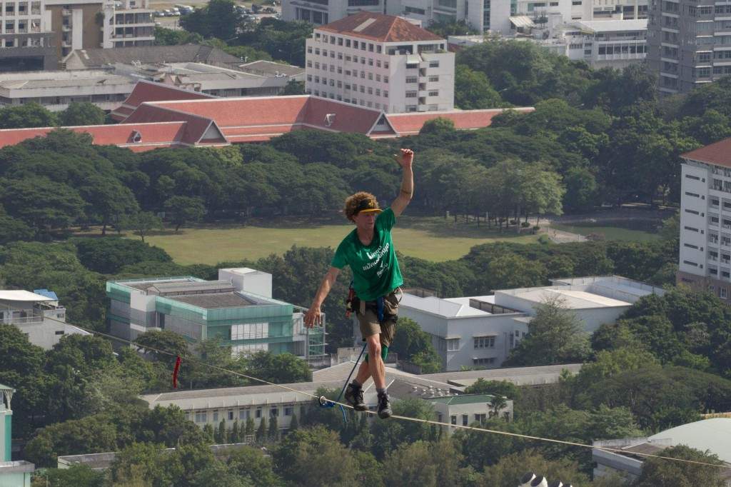 U.S. slackliner Andy Lewis of Calif. balances on a slackline in Bangkok, Thailand, July 23, 2014.