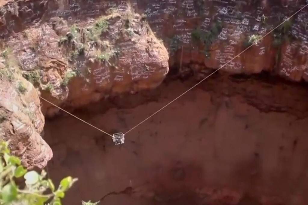This screengrab from video, released by Yemeni Civil Defense Authority, shows rescuers removing the body of daredevil adventurer Al-Qaqa Ibn Antar on Saturday, June 13, 2026, after he had fallen into a volcanic crater in southern Yemen while climbing without safety equipment on Friday.