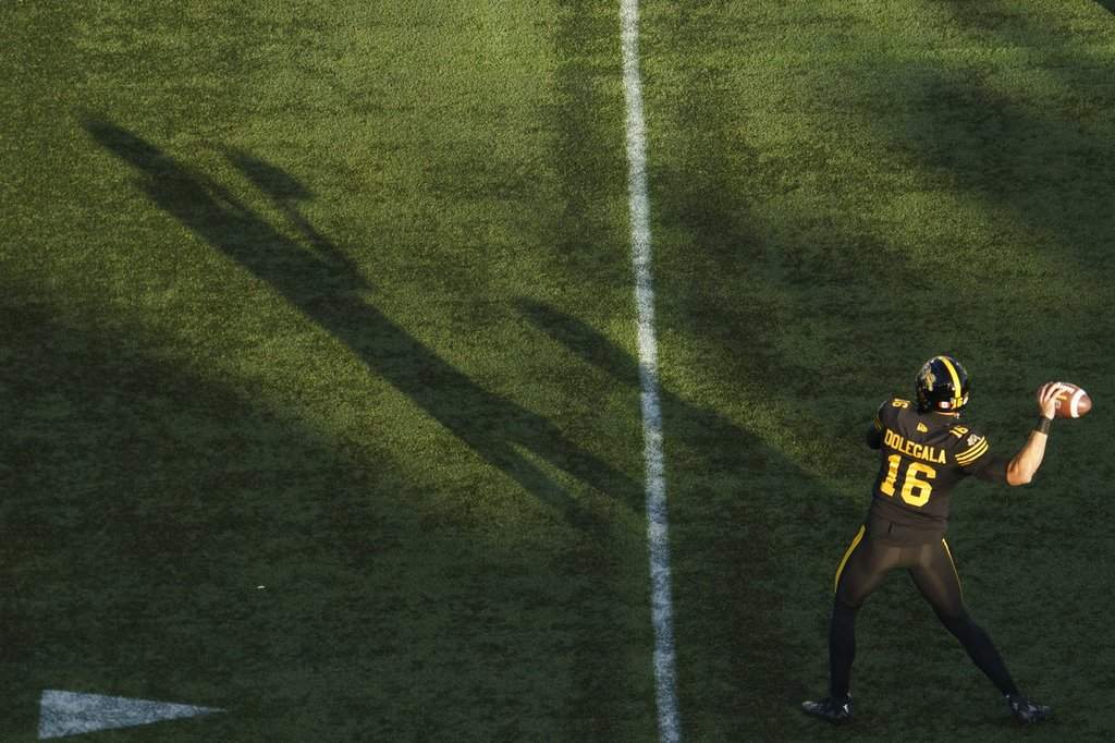 Hamilton Tiger Cats quarterback Jake Dolegala during warm up prior to CFL football game action in Hamilton, Ont., Saturday, Sept. 20, 2025. THE CANADIAN PRESS/Peter Power.
