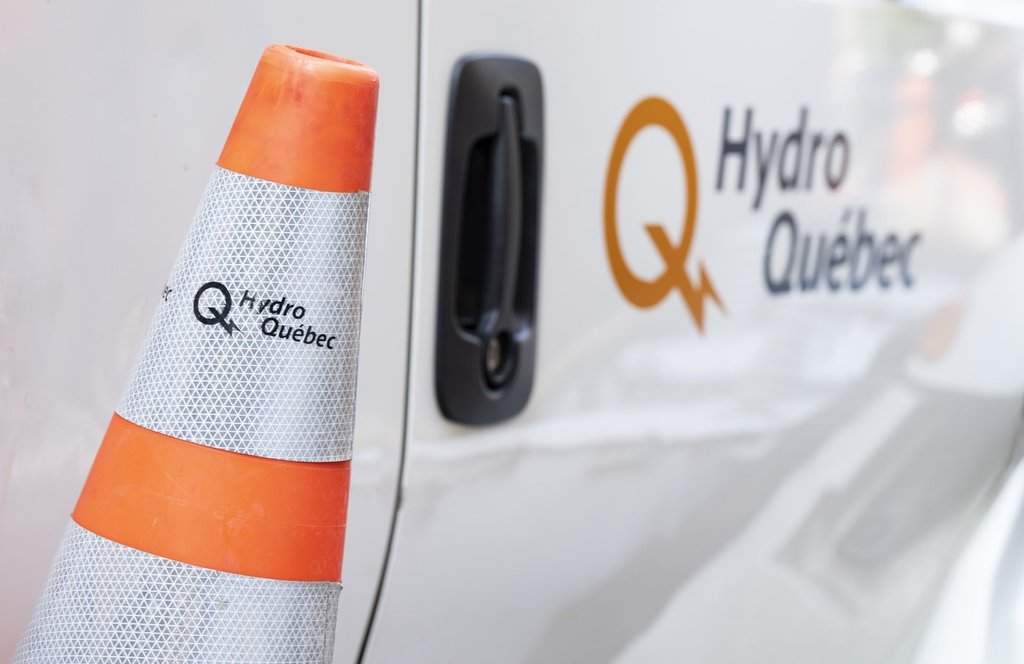 A Hydro-Québec truck is seen in Montreal, Friday, Sept. 1, 2023. THE CANADIAN PRESS/Christinne Muschi.