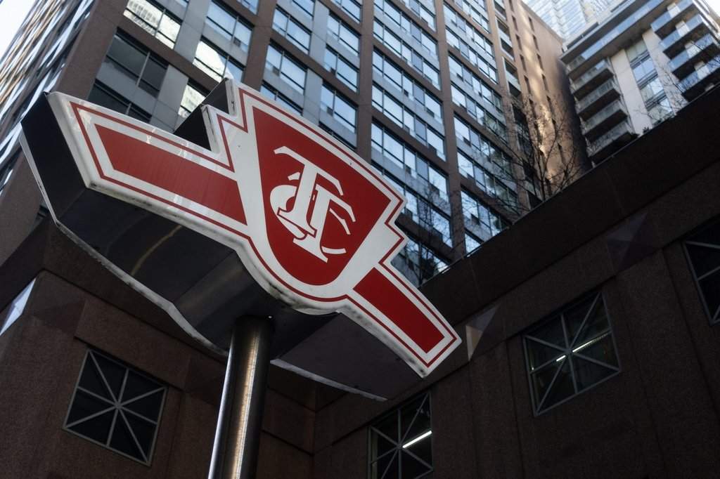 A Toronto Transit Commission sign is shown at a downtown Toronto subway stop Tuesday, Jan. 31, 2023. New data from Toronto's transit agency shows safety incidents against customers went down in the month of February after police boosted their presence in the system in late January.